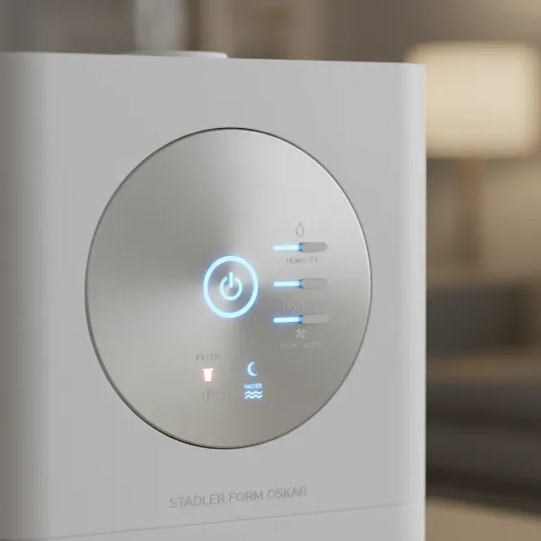 A close-up shot of the Stadler Form Oskar humidifier's control panel, highlighting its user-friendly interface with subtle LED indicators.